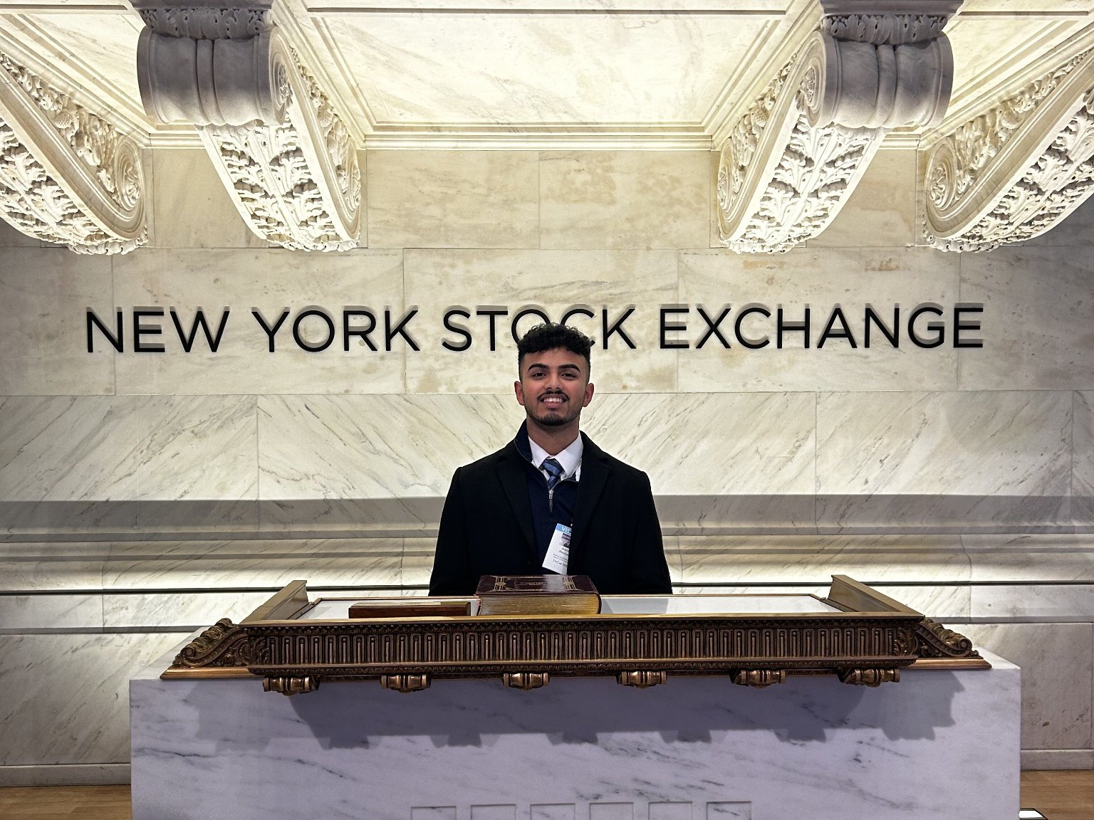 Austin at the New York Stock Exchange podium